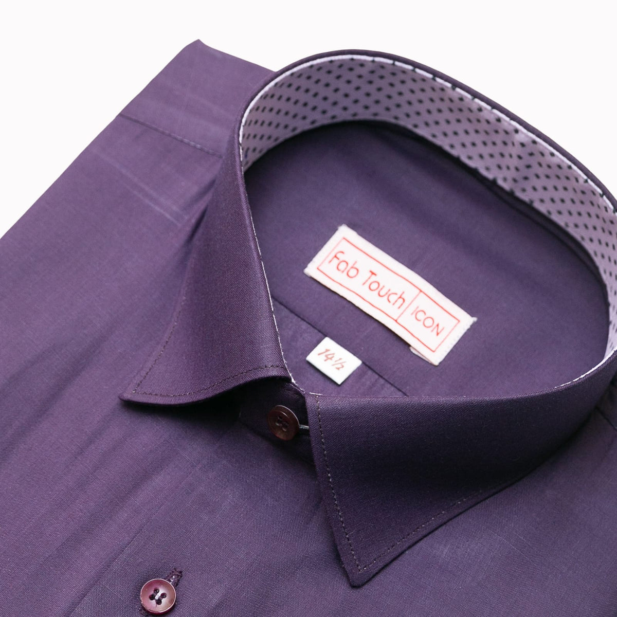 A close-up of a purple long-sleeve dress shirt with a spread collar, showing the inner patterned lining and a visible neck label that reads 'Fab Touch ICON'.